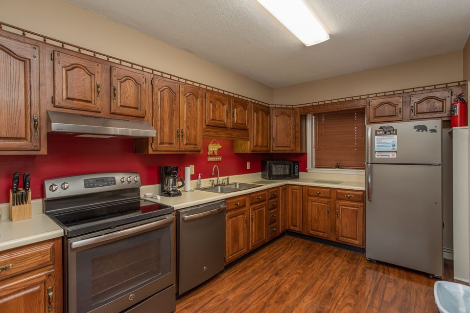 Fully equipped kitchen has stove, microwave, dishwasher, all the utensils too!