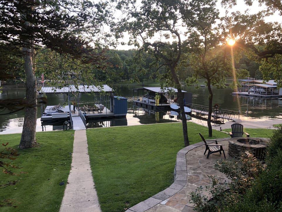 Steps from back of house to dock.