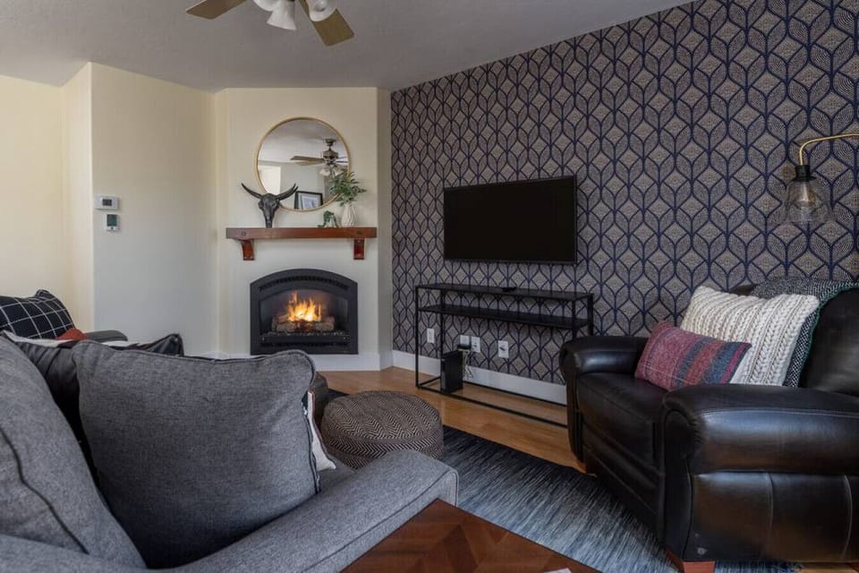 View two of living room with propane fireplace