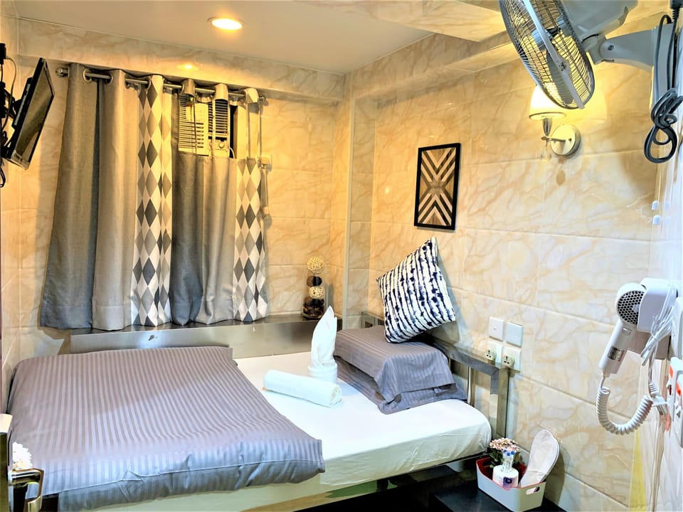 Blackout drapes, free WiFi, bed sheets