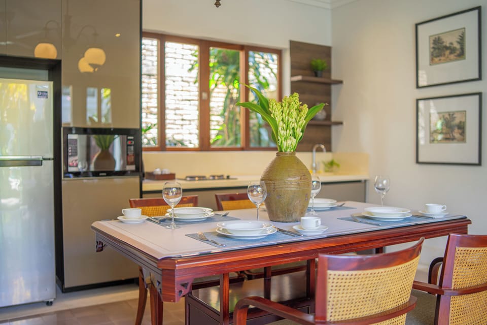 2 Bedroom Apartment with Pool Access | Private kitchen | Stovetop, electric kettle, cleaning supplies, freezer