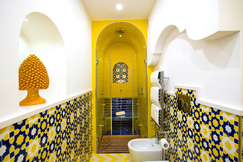 Deluxe Suite, Sea View | Bathroom | Free toiletries, hair dryer, slippers, bidet