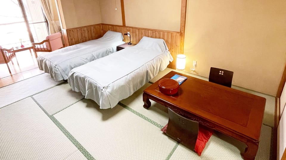 Desk, laptop workspace, free WiFi, bed sheets