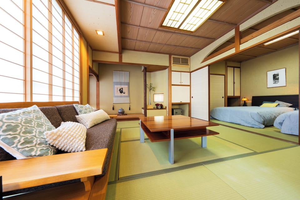Luxury Suite, Non Smoking | Down comforters, in-room safe, WiFi (free), individually decorated