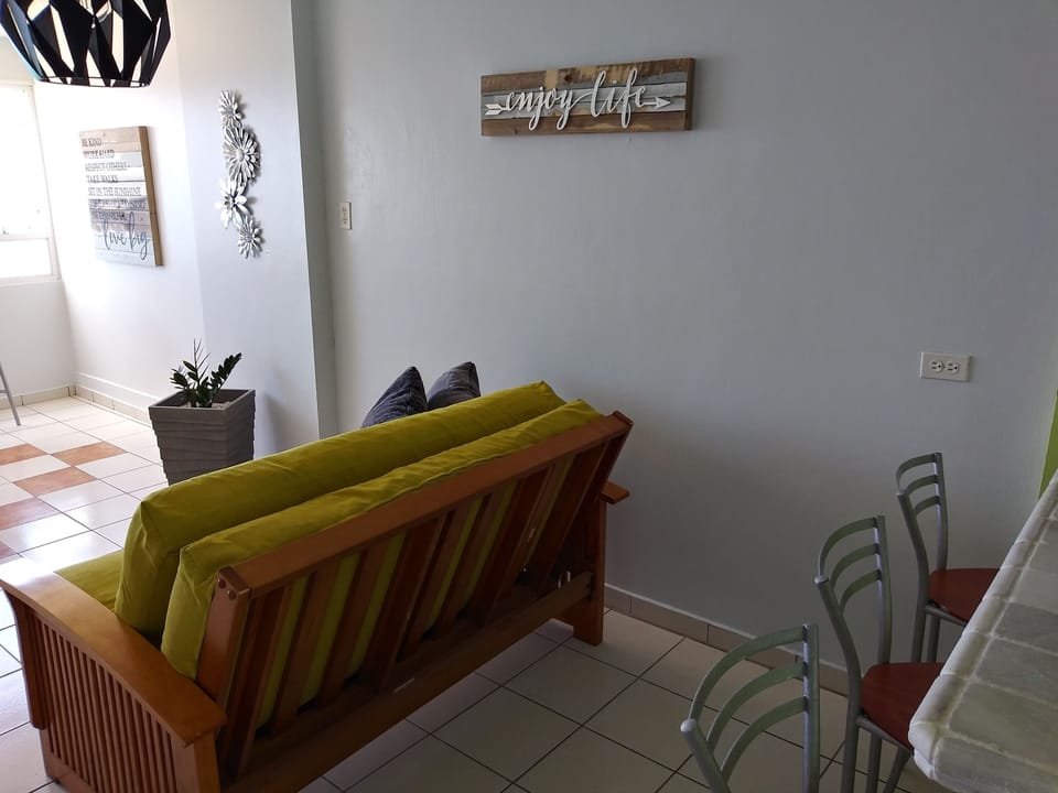 Apartment, Sea View | Living area | TV