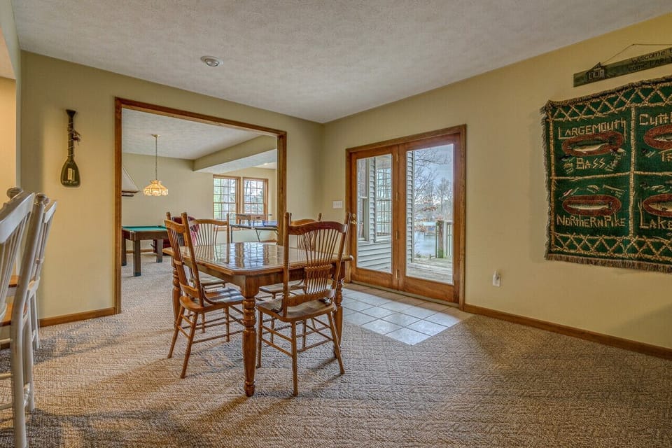 Well-appointed den with a sizable TV and gaming options, perfect for cozy movie marathons or family game nights.