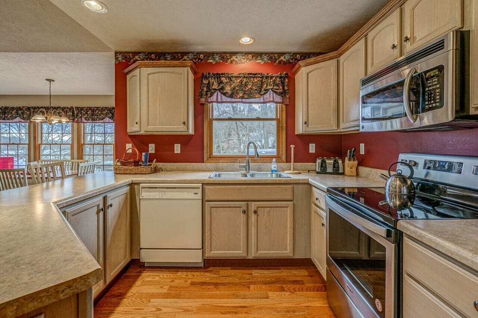 Cozy kitchen with a functional layout and modern amenities perfect for quick meals and gatherings.