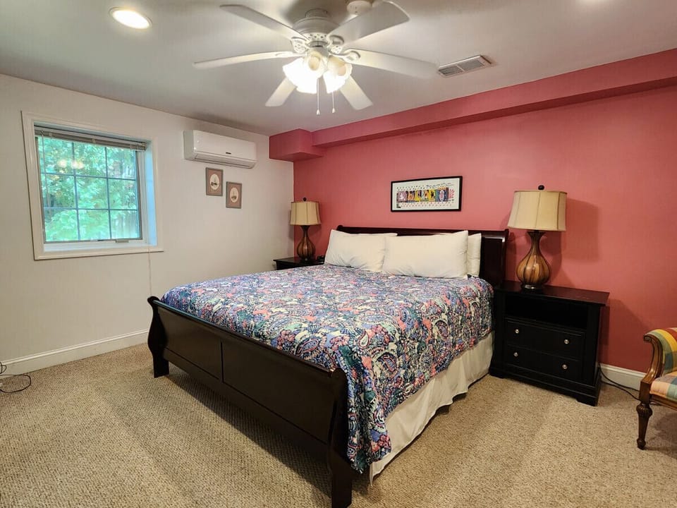 Experience tranquility in a well-furnished guest room with inviting touches and soft lighting.