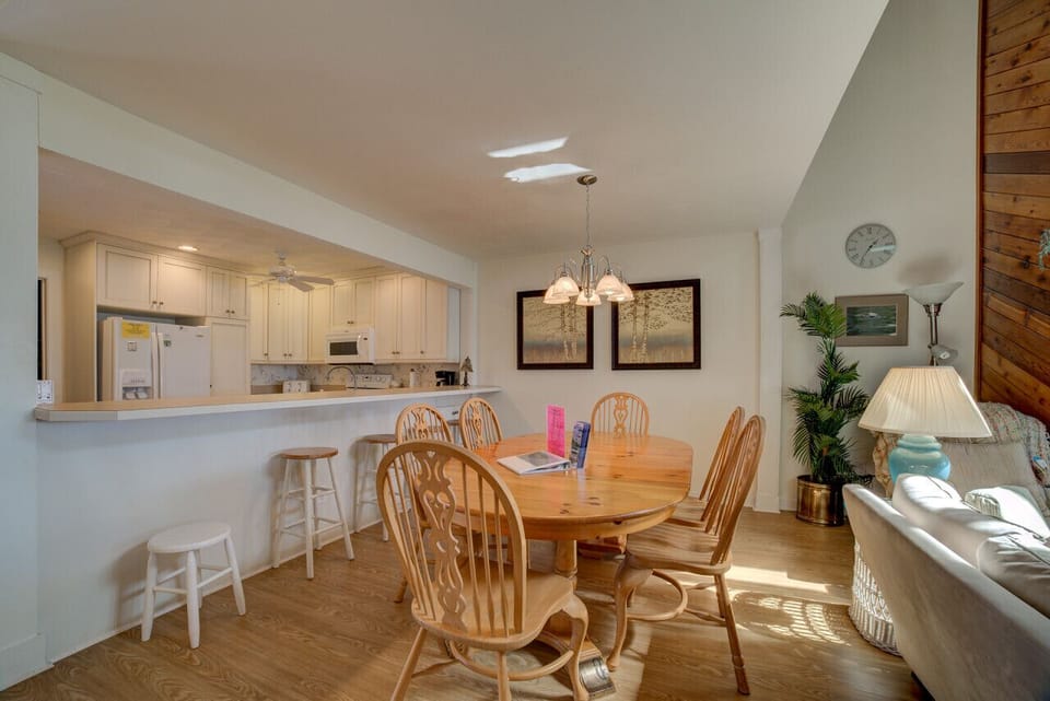 Enjoy meals together at the dining table, perfect for family dinners and gatherings.
