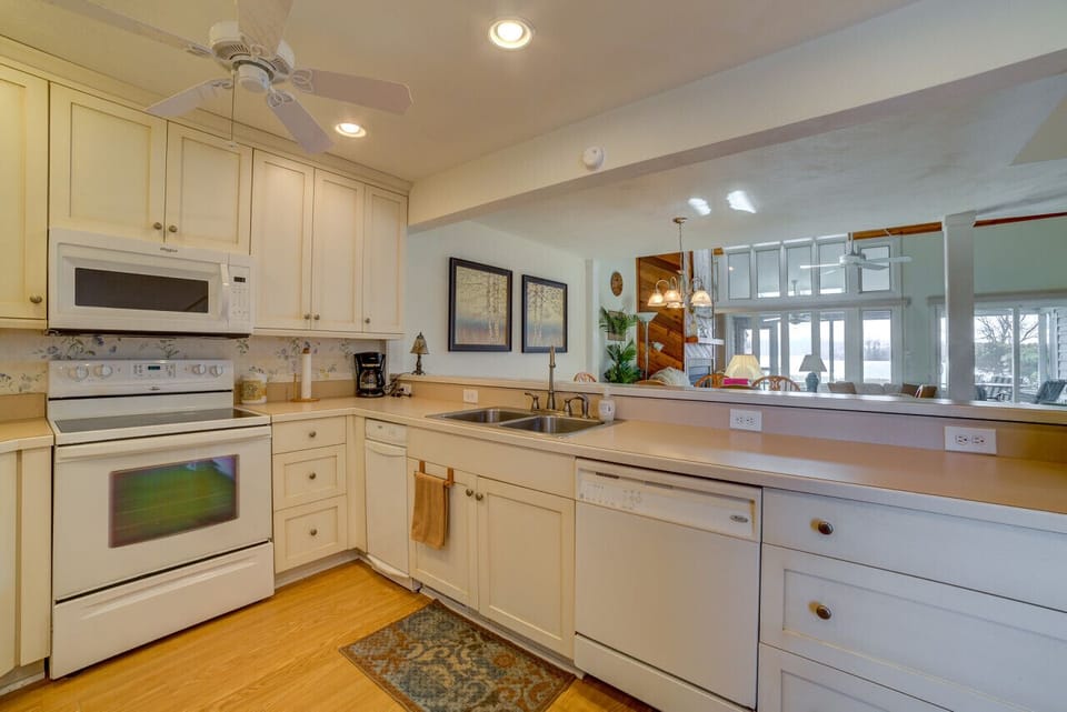 Modern kitchen with essentials for home-cooked meals and gatherings.