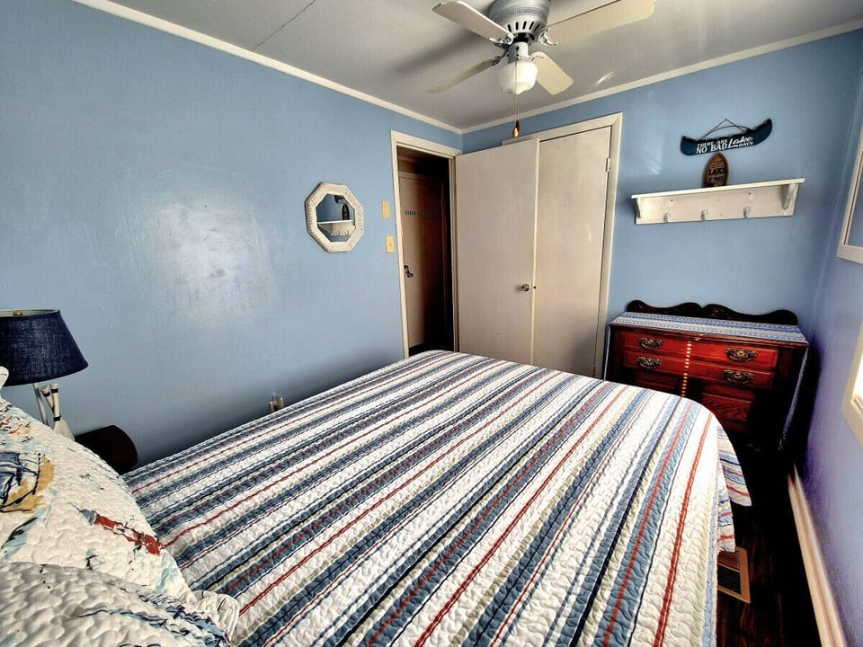 Rest comfortably in our charming guest bedroom with cheerful accents.