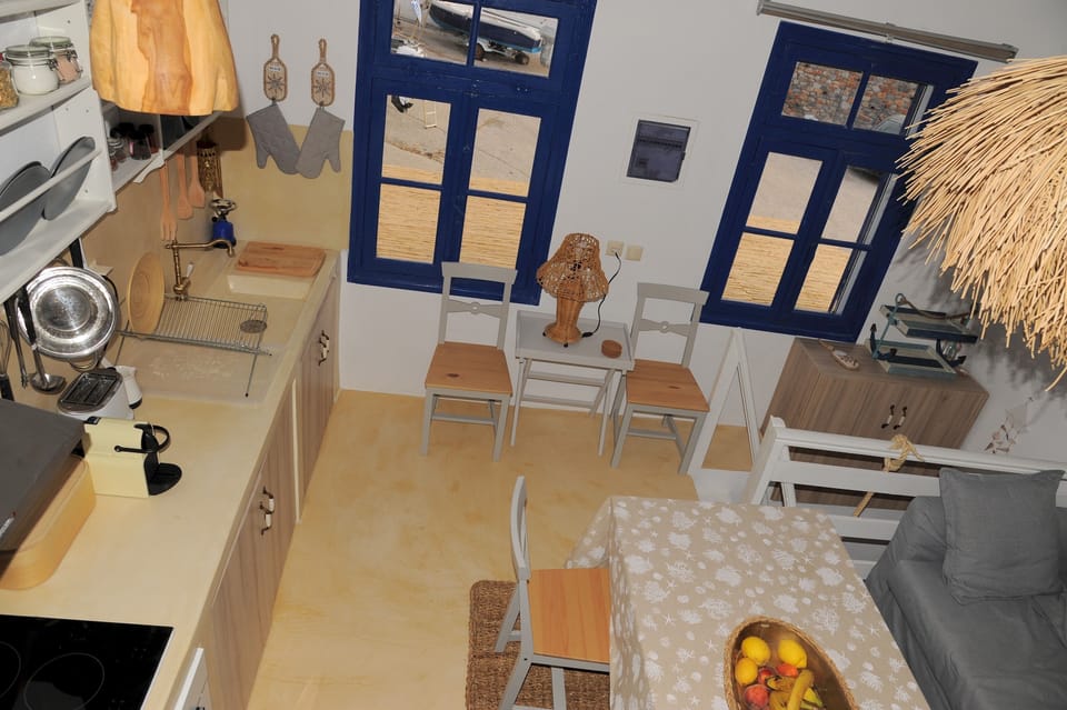 The kitchen and the dining table from above.