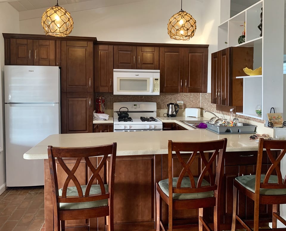 Kitchen with big fridge to keep
Those drinks cool