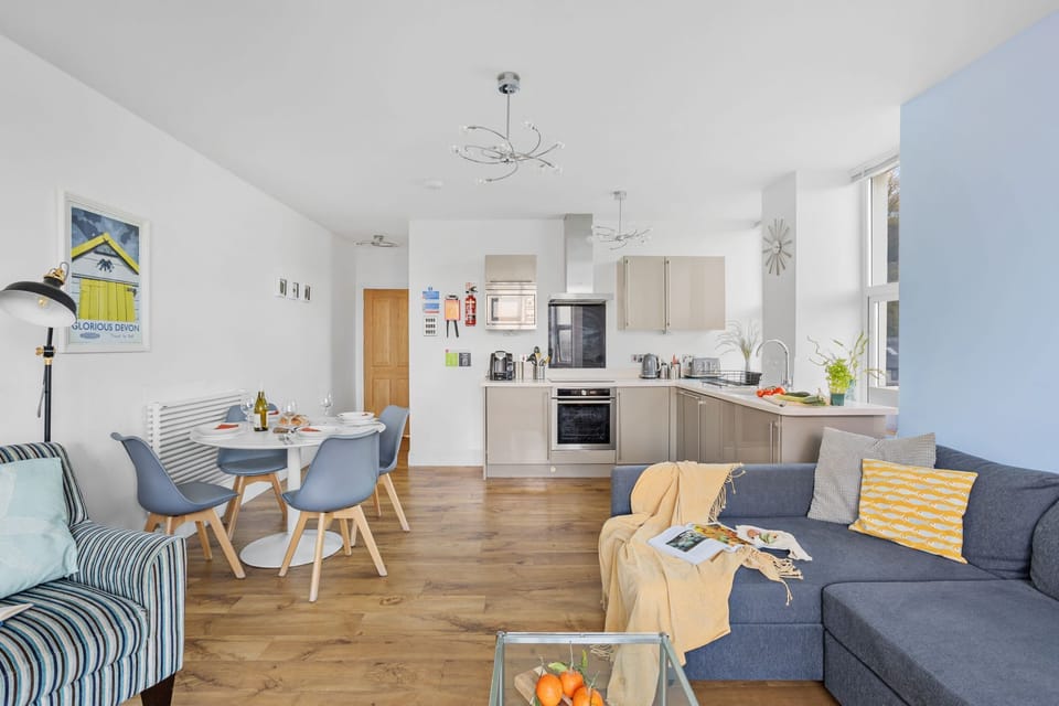 Open plan living, kitchen with dining table and living room