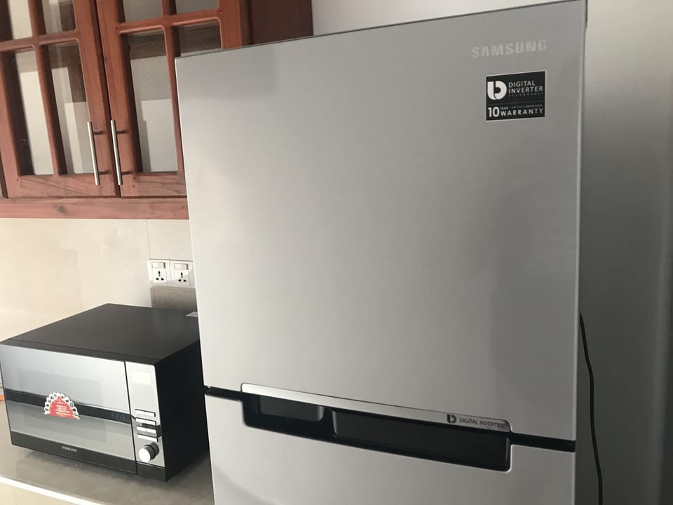 Fridge, microwave, cookware/dishes/utensils