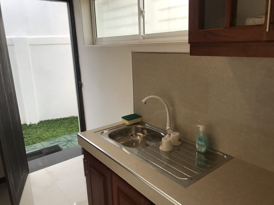 Fridge, microwave, cookware/dishes/utensils