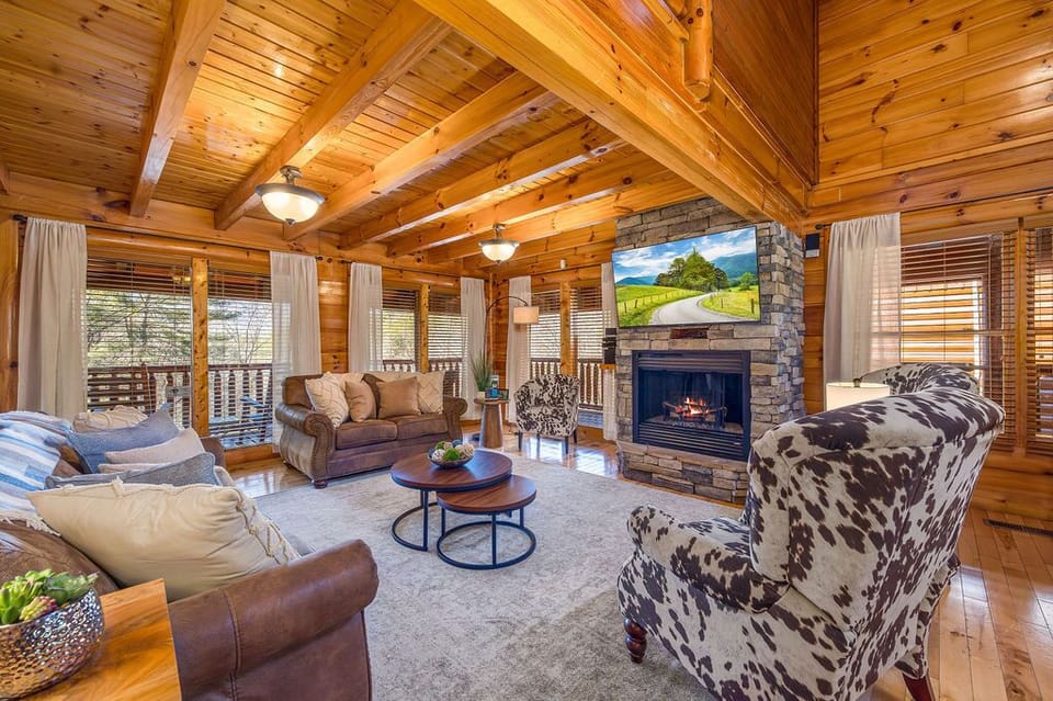 Cabin, Multiple Beds, Hot Tub | Living area | 65-inch flat-screen TV with cable channels, TV, fireplace