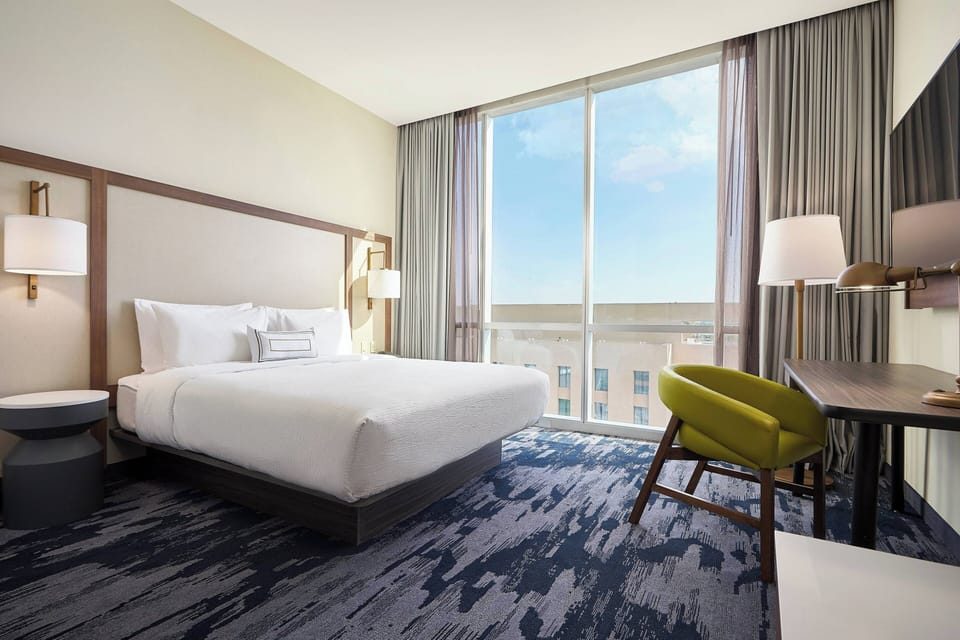 Room, 1 King Bed, City View | In-room safe, desk, laptop workspace, blackout drapes