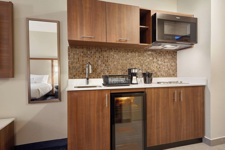 Room, 1 King Bed with Sofa bed, City View | In-room safe, desk, laptop workspace, blackout drapes