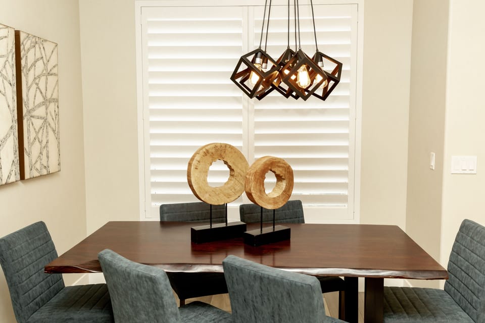 Kitchen dining table and festive light fixture