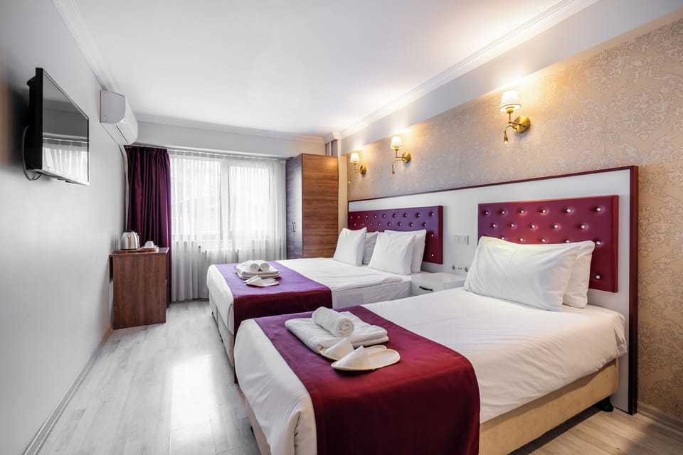 Standard Triple Room, City View | Premium bedding, minibar, laptop workspace, free WiFi