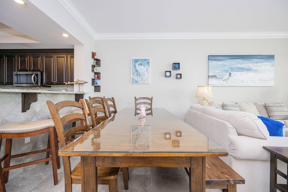 Gather around the spacious dining table, perfect for playful game nights or sharing stories with loved ones