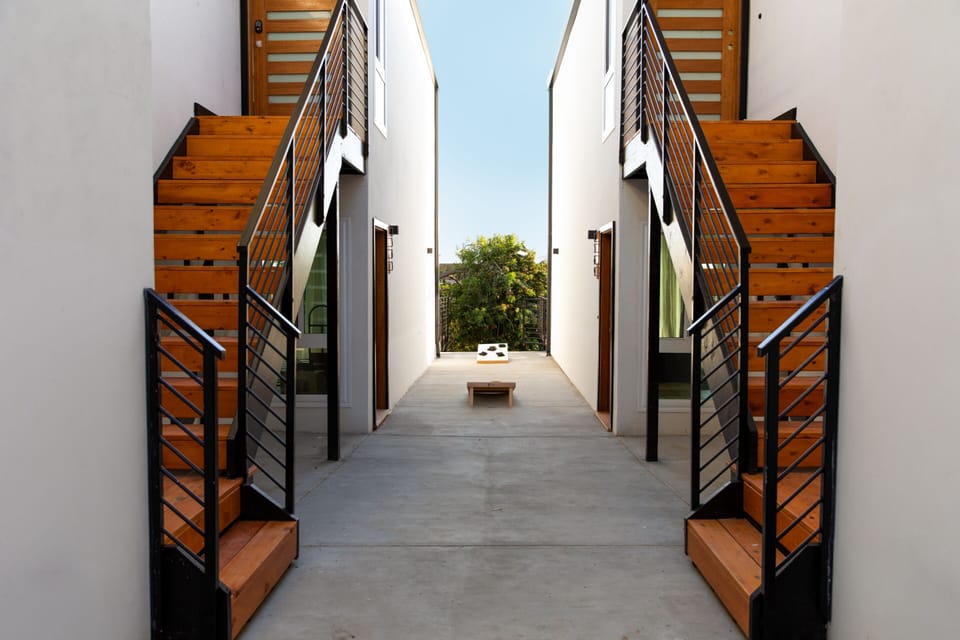 Entryway into units. You will have the ones on the right side (one unit on the top and the other on the bottom floor)