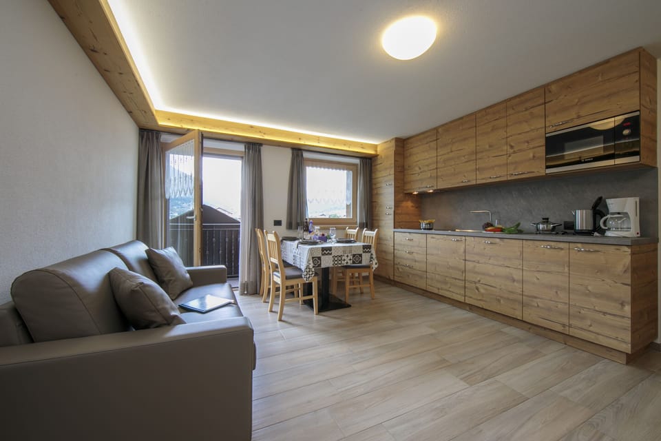 Living room with kitchen and dining area