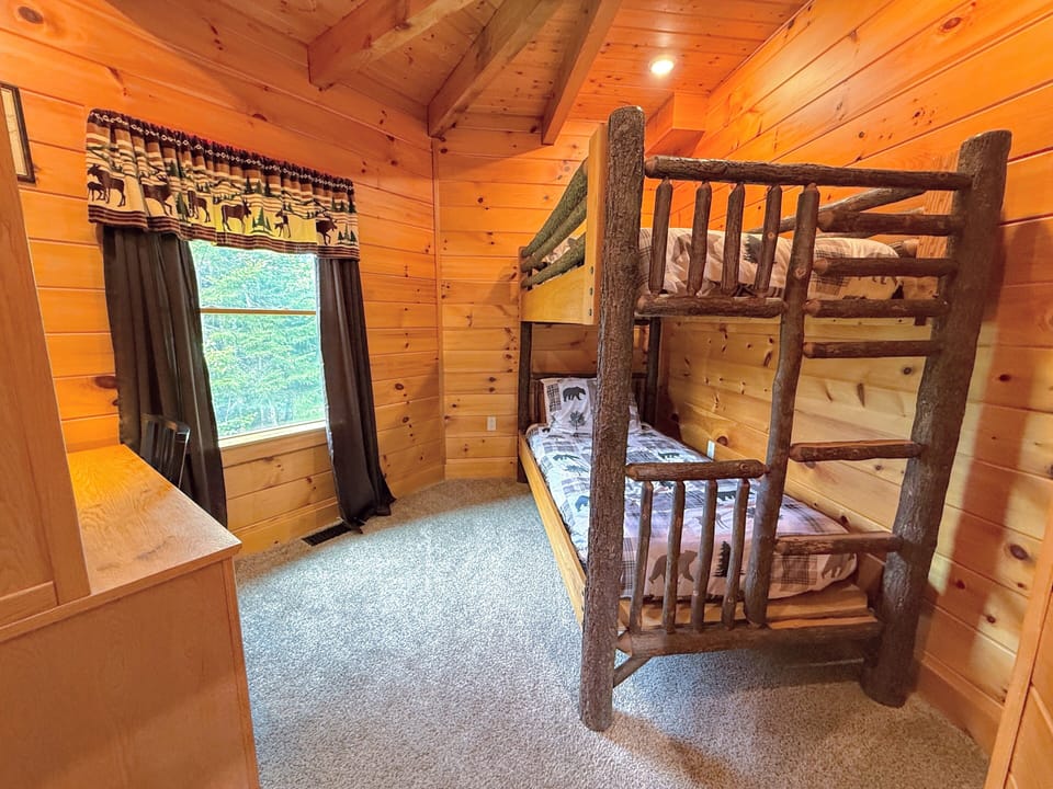 Main level bunk room with desk