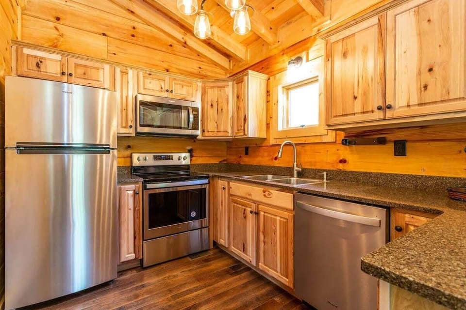 Kitchen complete with stainless steel appliances and granite countertops!