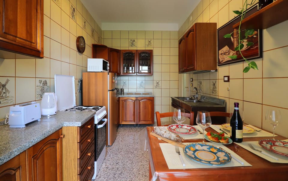 Premium Apartment, 3 Bedrooms, Terrace | Private kitchen | Full-size fridge, microwave, oven, stovetop