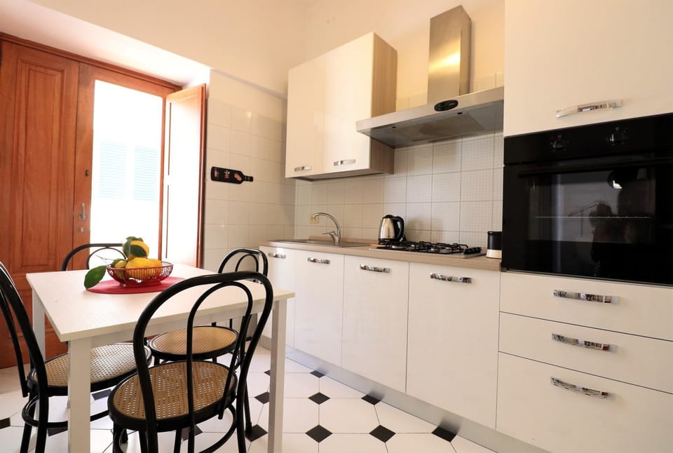 Apartment, 1 Bedroom, Balcony, Beachside | Private kitchen | Full-size fridge, microwave, stovetop, coffee/tea maker