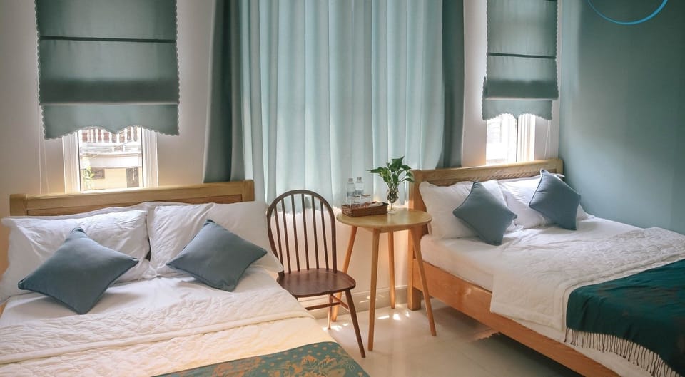Standard Quadruple Room | Minibar, desk, blackout drapes, iron/ironing board (on request)