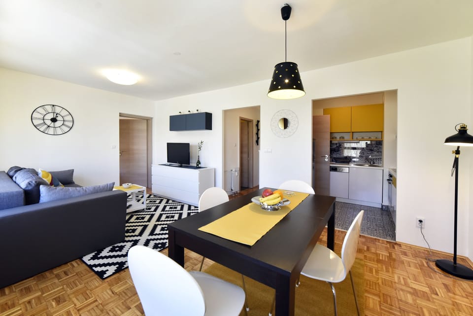 Apartment, 2 Bedrooms | Living area | Flat-screen TV