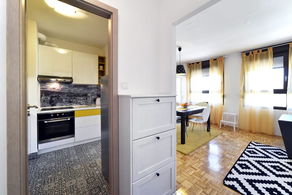 Apartment, 2 Bedrooms | Living area | Flat-screen TV