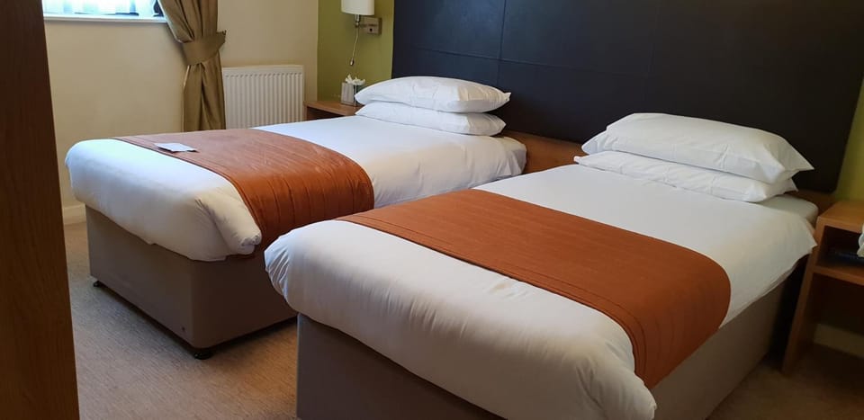 Desk, iron/ironing board, free WiFi, bed sheets