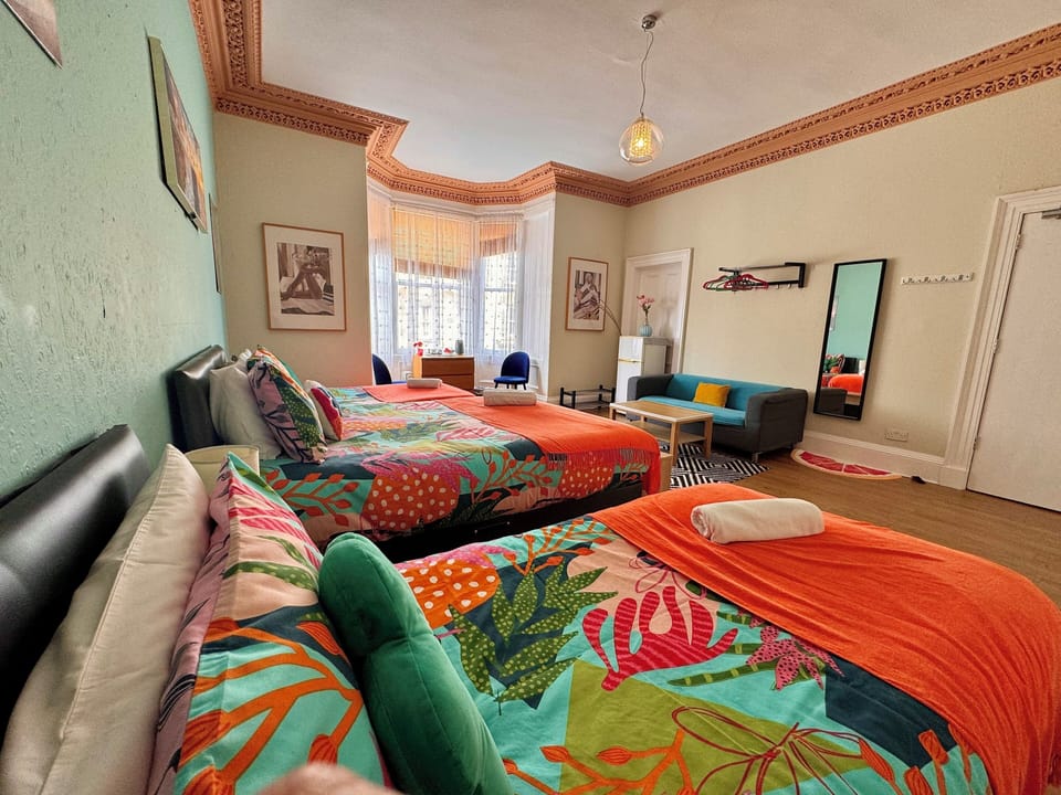 Quadruple Room, Shared Bathroom (Room 1) | Blackout drapes, iron/ironing board, free WiFi, bed sheets