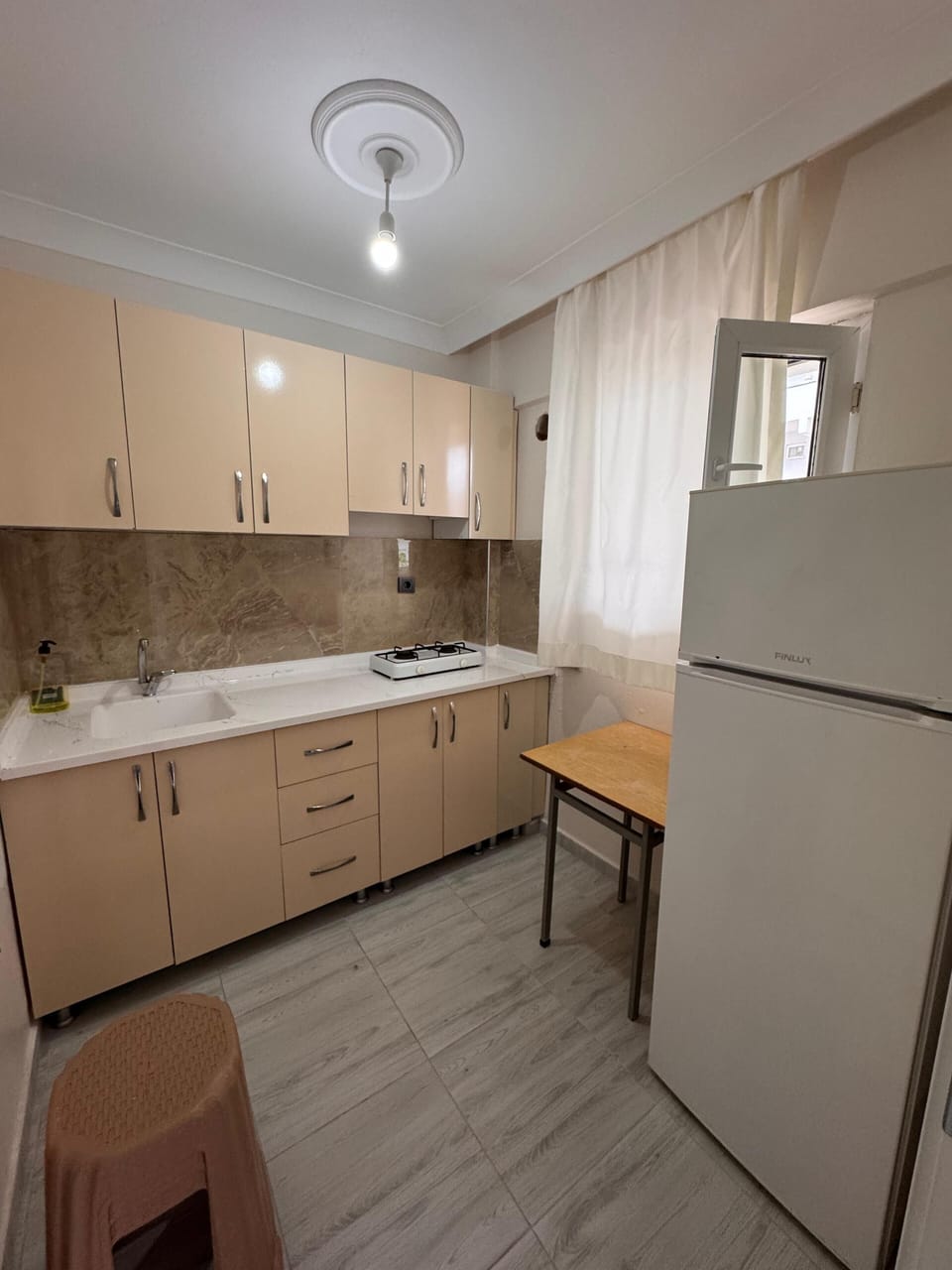 Comfort Apartment, City View | Private kitchen | Mini-fridge