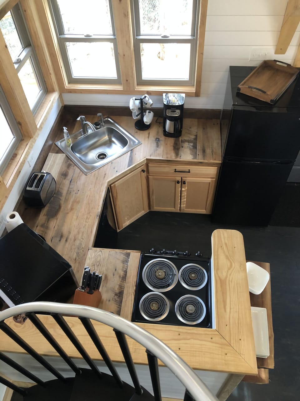 View of kitchen from the top of the spiral staircase