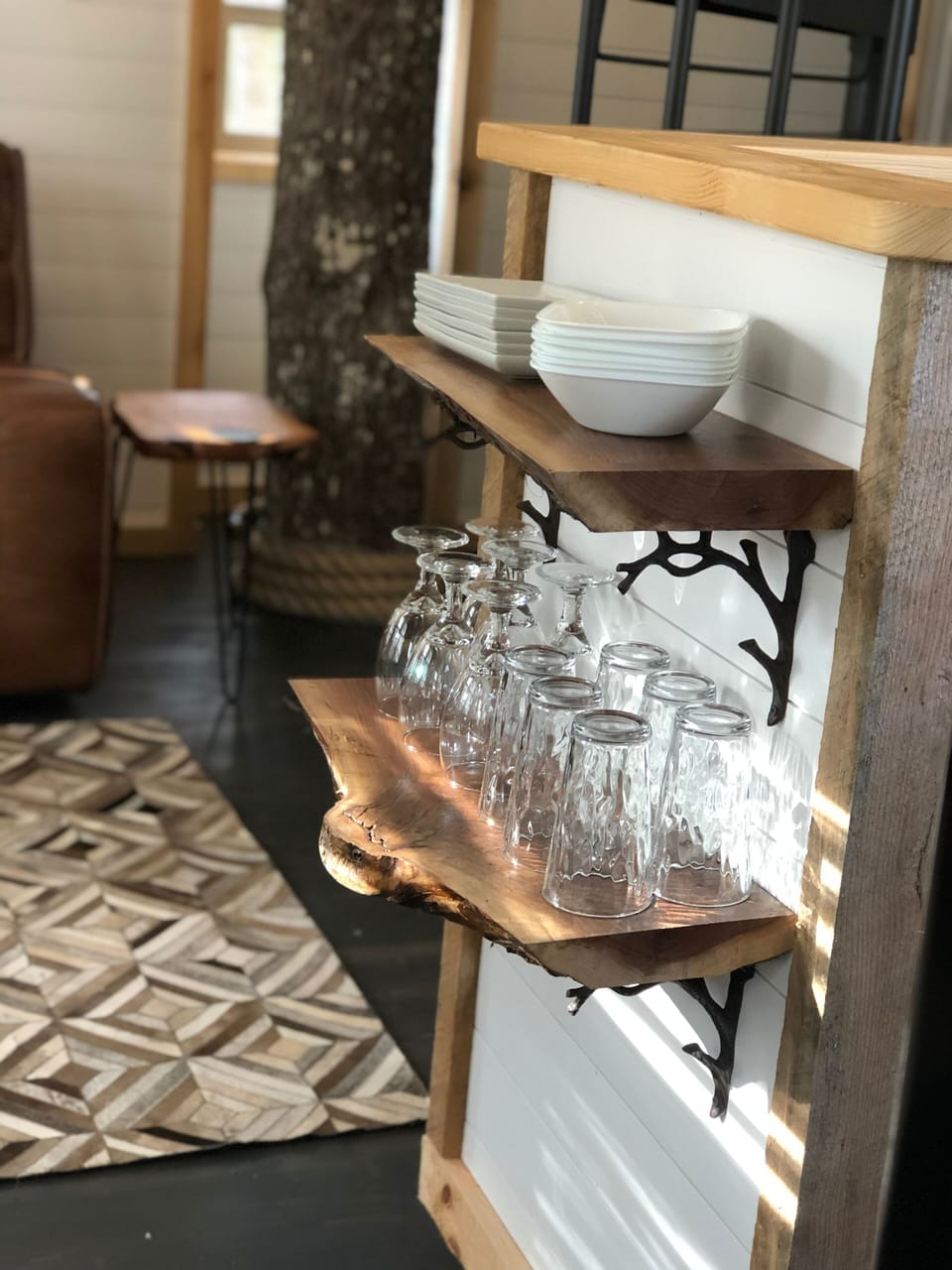 Live edge walnut shelves just outside the kitchen