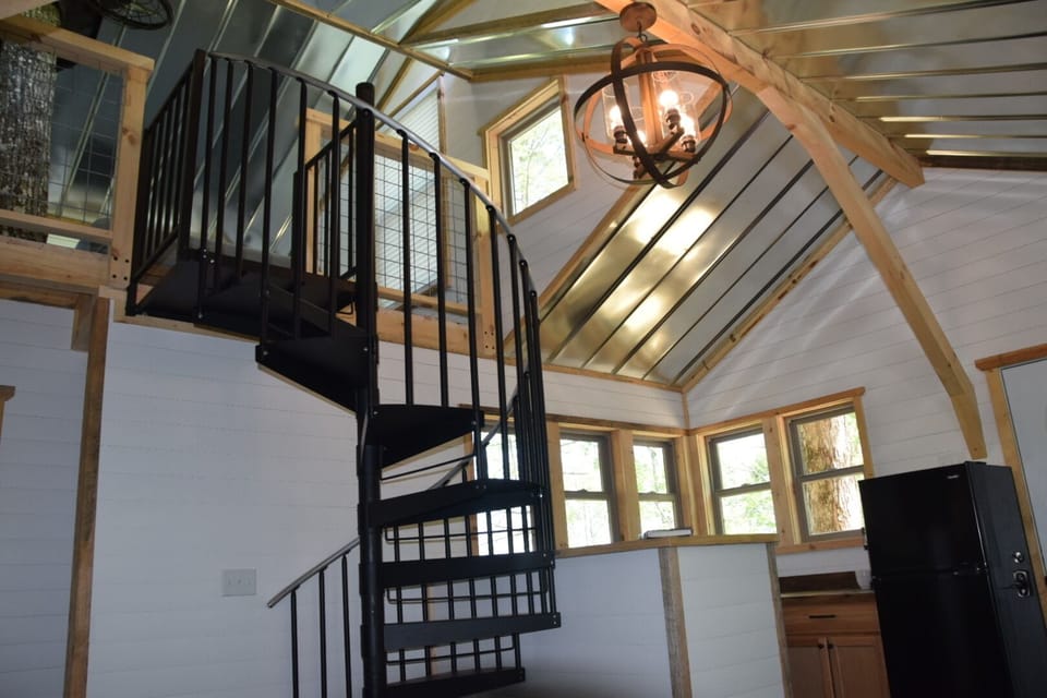 Spiral staircase, galvanized ceiling, cool chandalier, loft,  etc...
