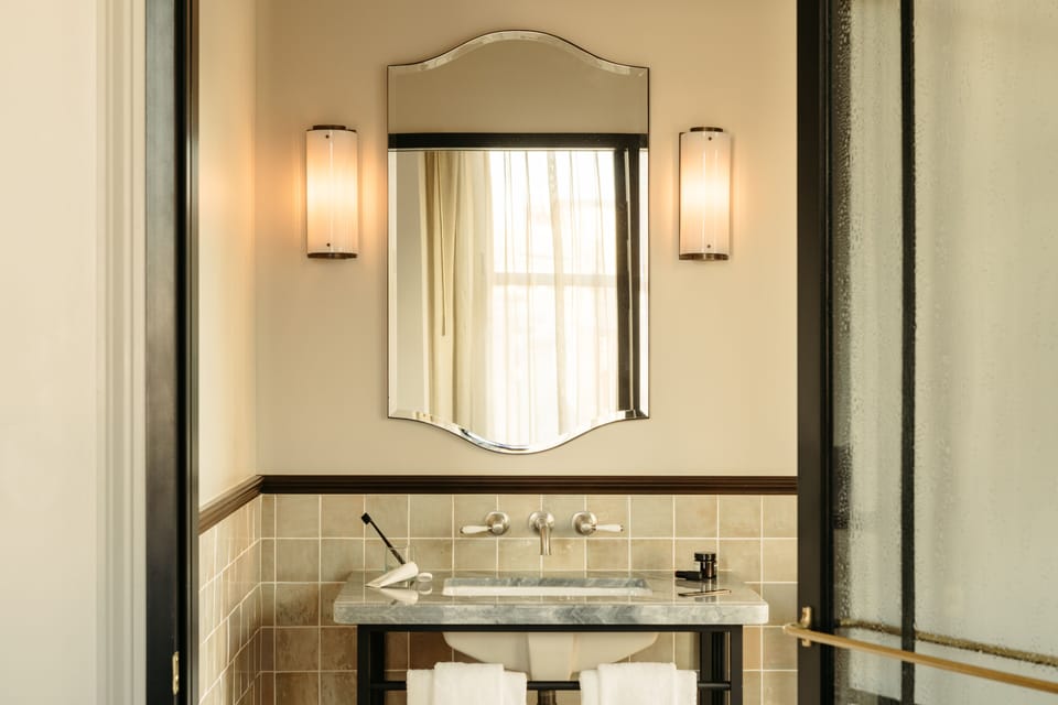 Designer toiletries, hair dryer, towels, soap