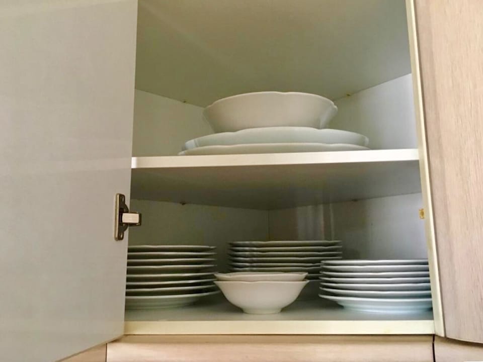 Well Stocked Crockery Cupboard