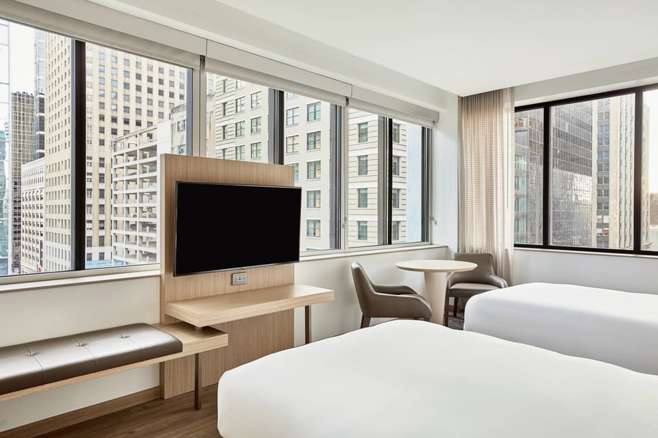 Room, 2 Double Beds, City View (Corner) | Hypo-allergenic bedding, desk, soundproofing, iron/ironing board
