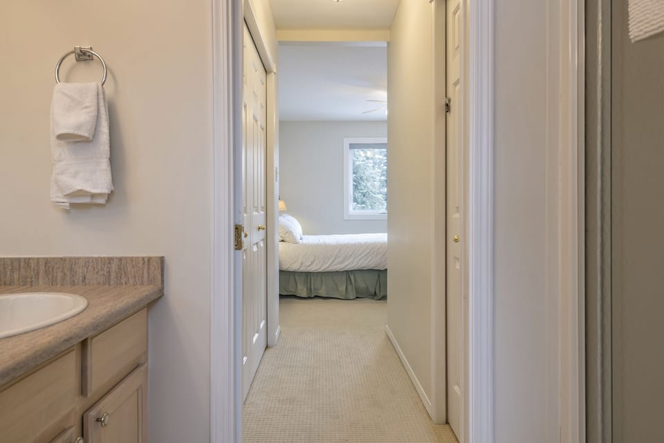 Master Bedroom and Hallway to Closet and Ensuite