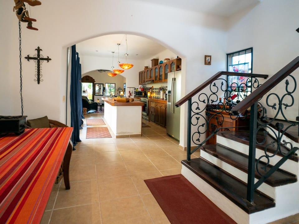 The welcoming entry way - Step right in or head up the lovely staircase to the second floor