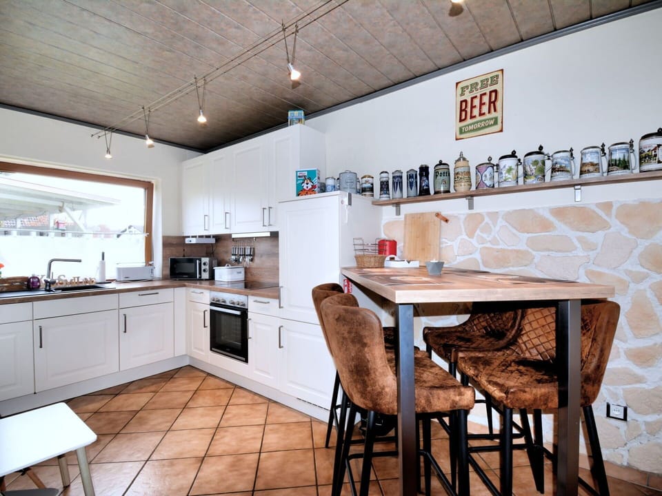 Cabinetry, Furniture, Property, Countertop, Wood, Kitchen, Interior Design, Kitchen Stove, Wood Stain, Kitchen Appliance