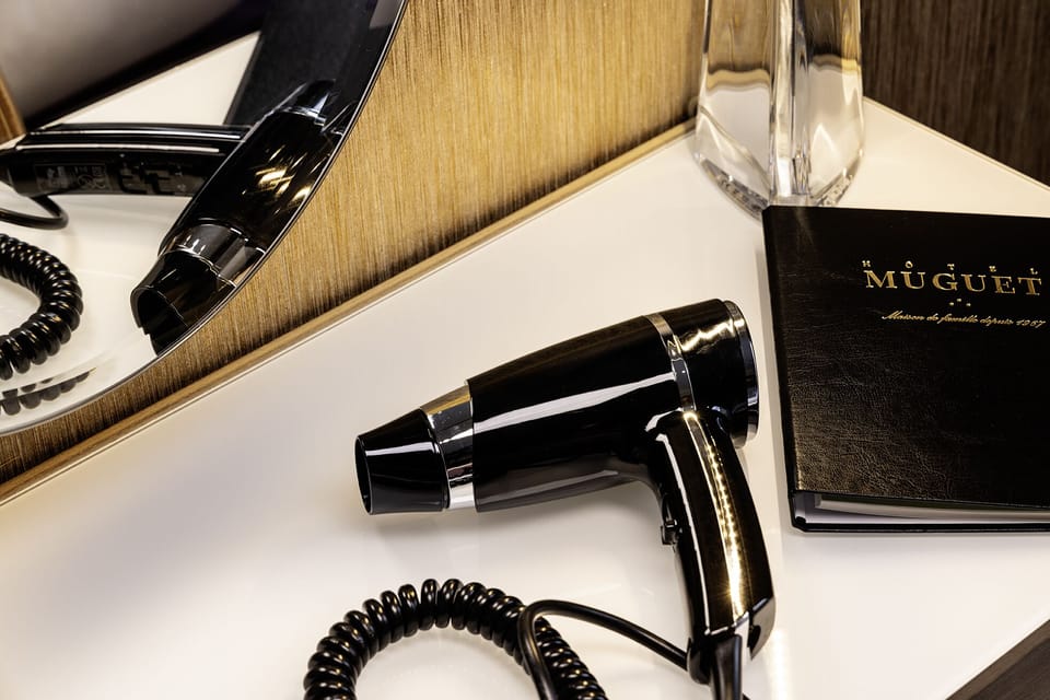 Shower, rainfall showerhead, hair dryer, towels