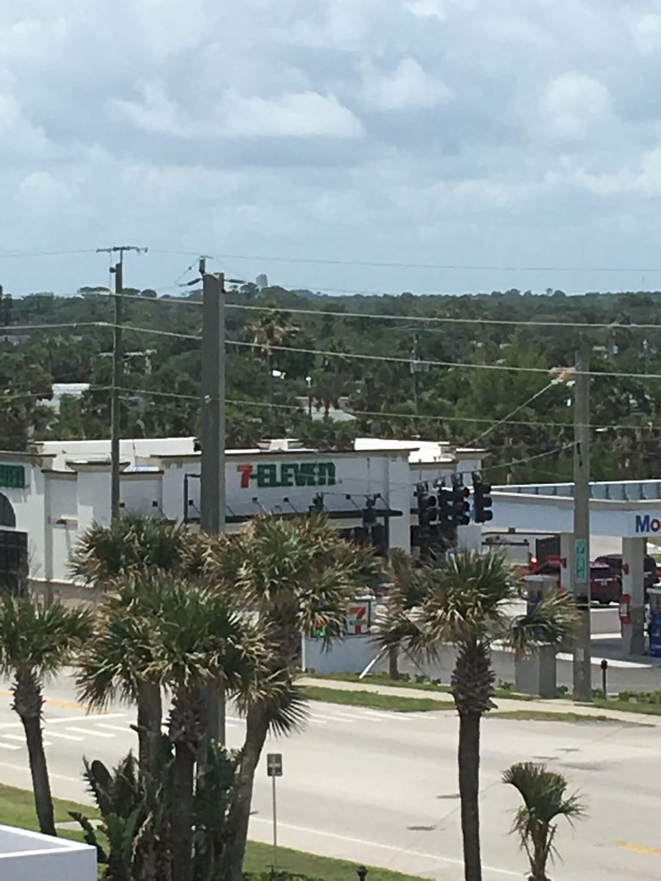 7-11 gas station and Dunkin Donuts across the street