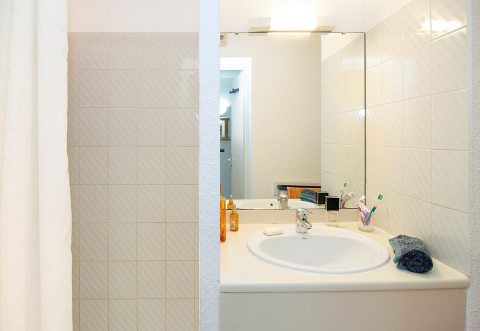 Get ready for your day in the lovely bathroom.